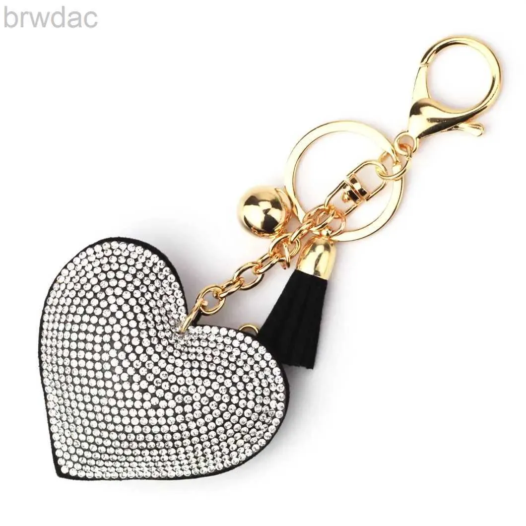 Ringos -chave Branda de luxo Maneio de cristal Pingente de chaves de cristal para feminino Bolsa e carro com chaveiro de metal Acessórios de chaves 240412