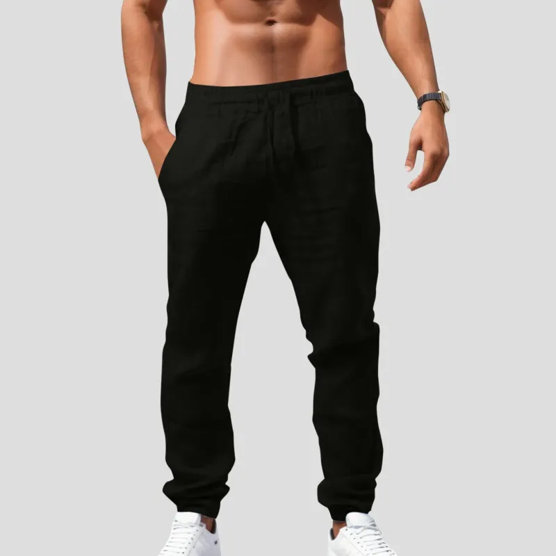 カジュアルな固形色のメンズパンツ弾性ゆるい通気性パンティーファッショナブルな性格スリミングフィッティング男性ズボン