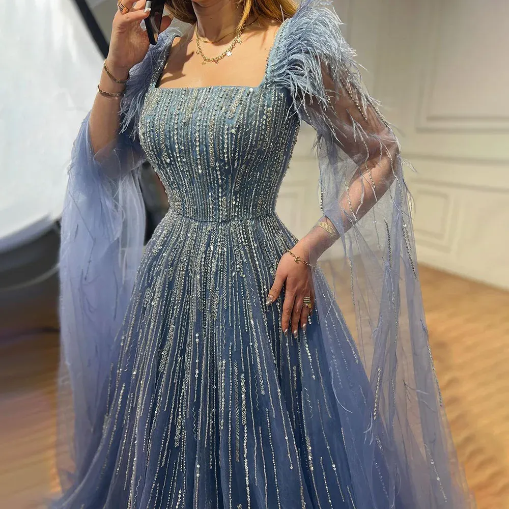 Luxury Blue Evening Dress with Cape Sleeves Beaded Floor-Length Gown for Formal Events from Dhgate Bridal Veils - price 367.29 Luxury Blue Evening Dress with Cape Sleeves Beaded Floor-Length Gown for Formal Events from Dhgate Bridal Veils - price 367.29