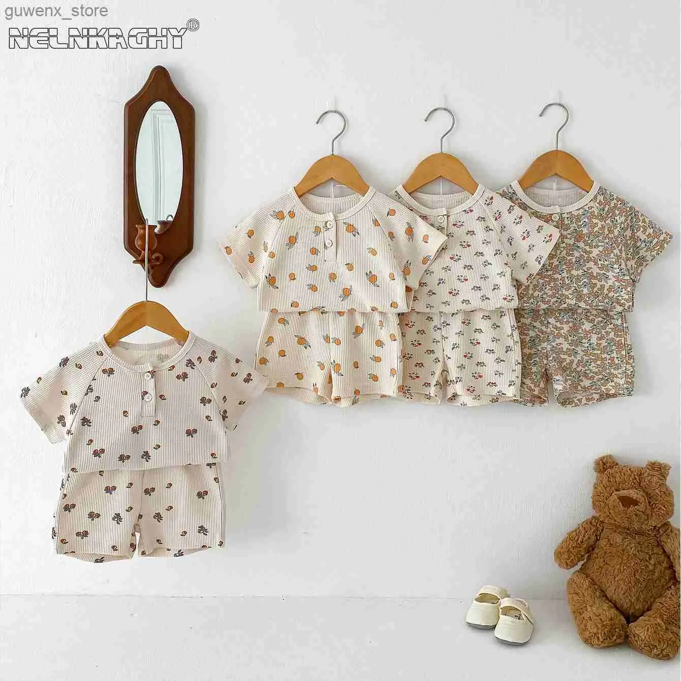 Kledingsets 2024 Zomer nieuw in baby jongensmeisjes Wafle Clothing Set 2pcs-Kids Toddler T-shirts + shorts pasgeboren print kleding 0-3Y Y240412