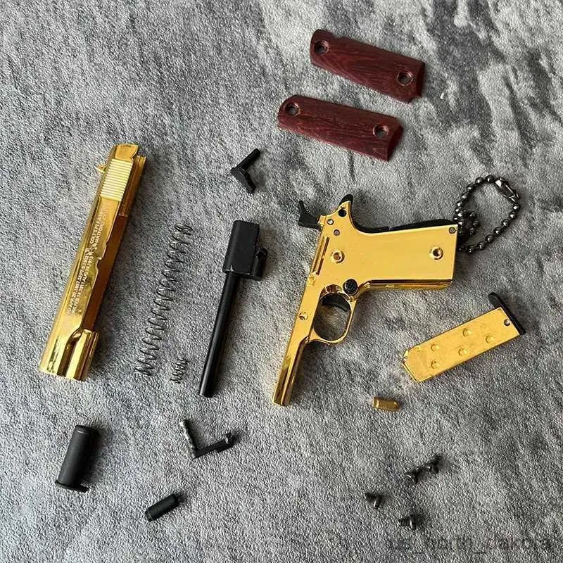 Anneaux Nouveauté Articles Antistress Toys Mini Gun Pistol Toys Miniatures Modèle Keychain Full Shell Alloy ne peut pas tourner Gift R230818
