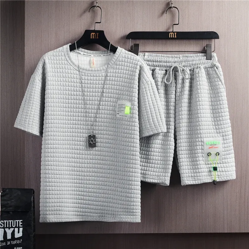 Shorts 2022 Sommerer Trend für neue Stil vielseitiger Herren -Color Casual Waffel Anzüge Kurzarm T -Shirt + Shorts Männliche Set Größe M3xl