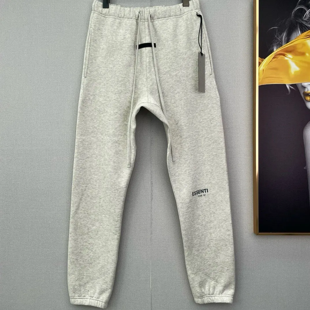 Calça de moletom de alta qualidade de alta qualidade para o clima frio Winter Homem calça de corrida Quantidade casual Algodão impermeável rz44f