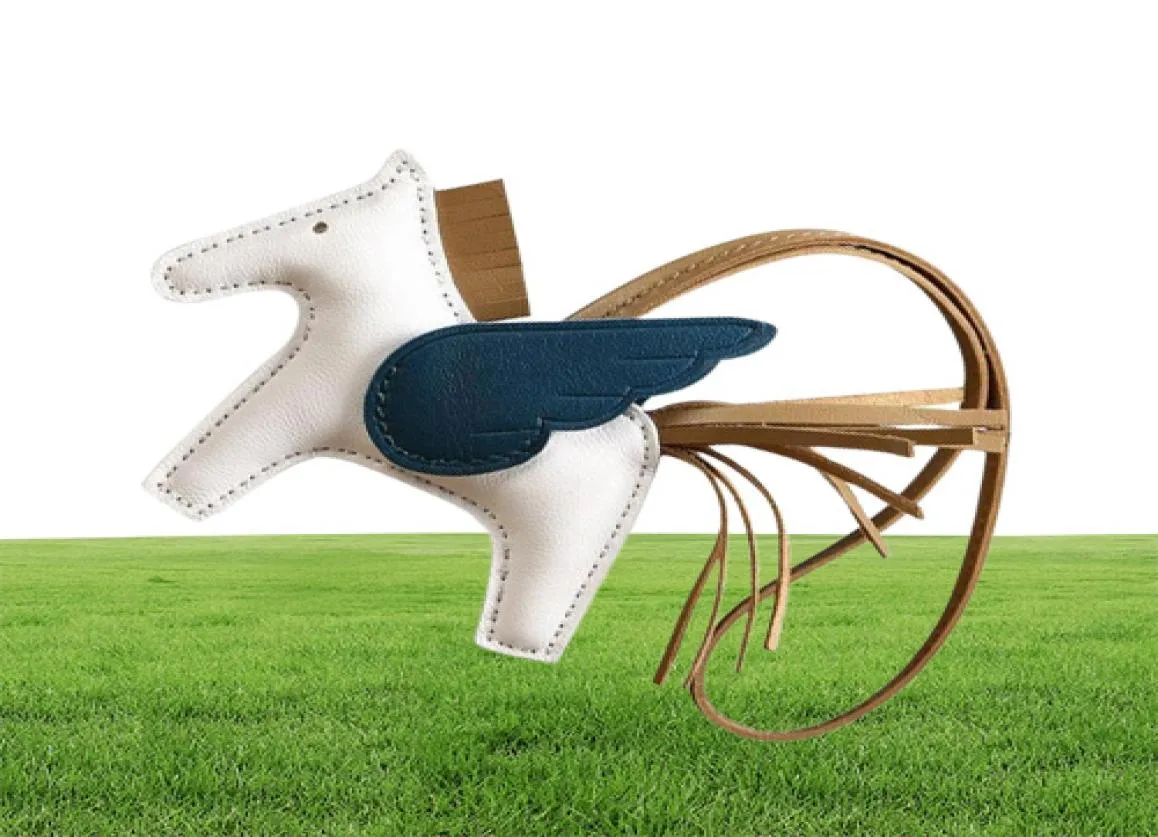 Lyxkedja högkvalitativ verklig fårläder flygande ponny hästnyckelring för kvinnor charm väska pendelle spegel hållare nyckelring7722657