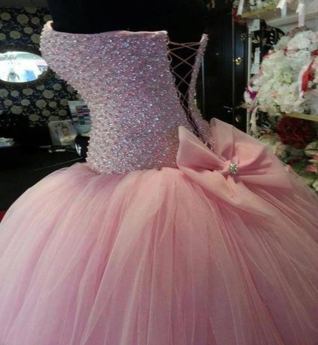 2017 New Puffy Pink Quinceanera Dresses with Big Bow Sweetheart Beaded Crystal Corset Lovely Sweet 16 Dress For 15 Years Prom Gown3352990