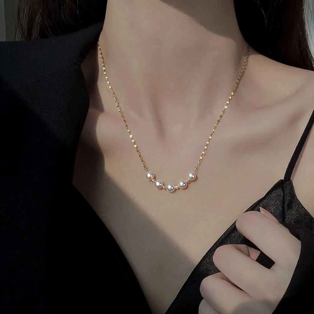 Imitation Pearl Necklace for Women in 2023 New Light Luxury and High End Design Sense Small Popular Internet Popularity Titanium Steel Lock Bone Chain Jewelry Tre