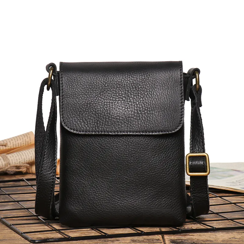 Zipper mannen retro flip zwarte kleine schoudertas echte lederen sling crossbody s minderheid design man eenvoudige telefoon