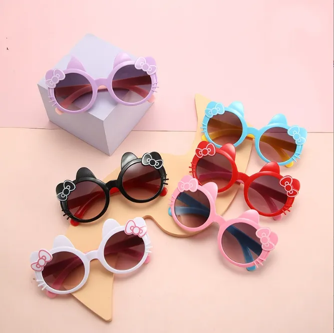 Enfants mignon dessin animé uv400 lunettes de soleil filles garçons couleurs couleurs extérieures enfants bowknot protection sol lunettes de soleil