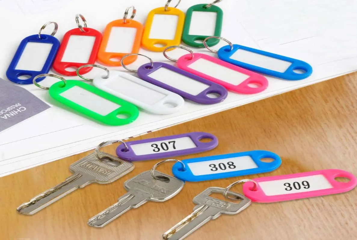 200pcs Plastique Keychain Clé Clé anneau de bricolage Nom des étiquettes pour les bagages à bagages de papier à bagages Mélanges Couleurs Clavier Chaîne Accessoires 2131842