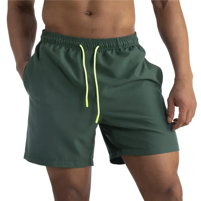 Swimwear Men Sexy Swimming Trunks Sunga Swimsuit Mens Briess de natation Shorts de plage Mayo de Praia Homens Maillot Bain 240412