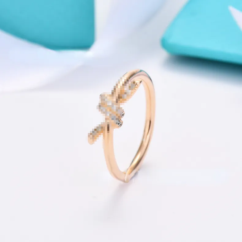 Couple Designer anneaux High Version Rogue de corde en diamant blanc cuivre cuivré 18k rose or européen American Fashion Glossy Ring