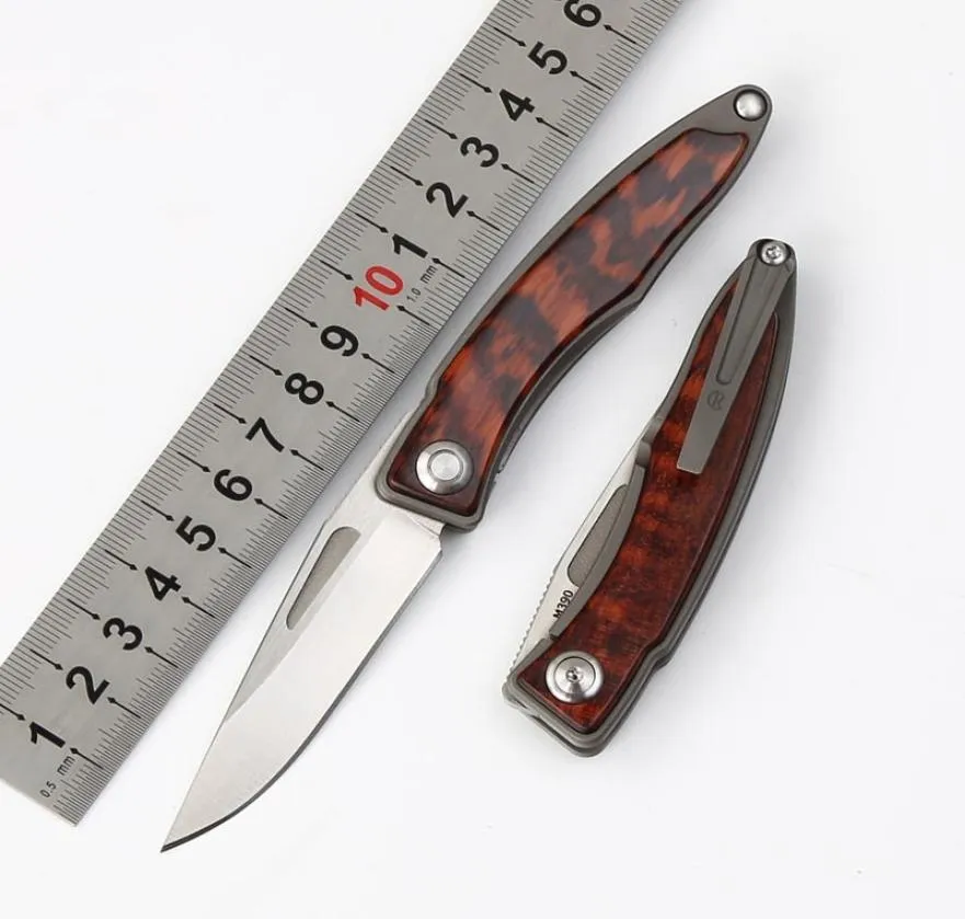 Alta reeve chris Cr Mnandi Knife in lega di coltello in lega di titanio tasca in legno M390 60HRC MINI KIFE EDC Sopravvivenza tattica CAM5309149