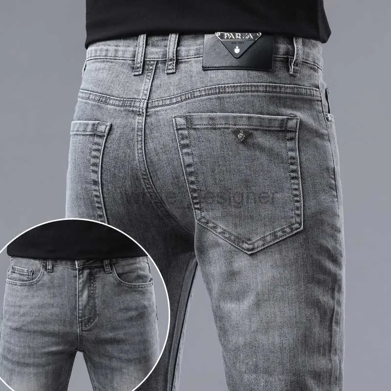 Luksusowe designerskie dżinsy na męskie dżinsy męskie cienki nowy produkt Slim Fit Mała stopa elastyczna modna młodzież szara spodnie mody spodnie