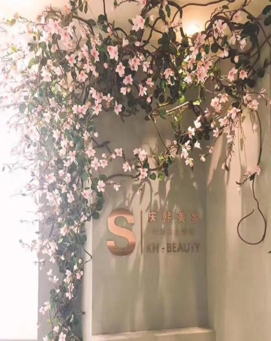 装飾的な花の花輪160cmシルクマグノリアブランチ人工ブドウの高品質の偽の花の壁ラタンガーランドホームウェディング6335059