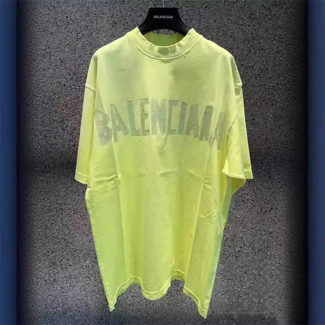 Edição de roupas de alta qualidade Edição Paris Padrão de papel impressão fluorescente amarelo queimado masculino de camiseta feminina manga curta