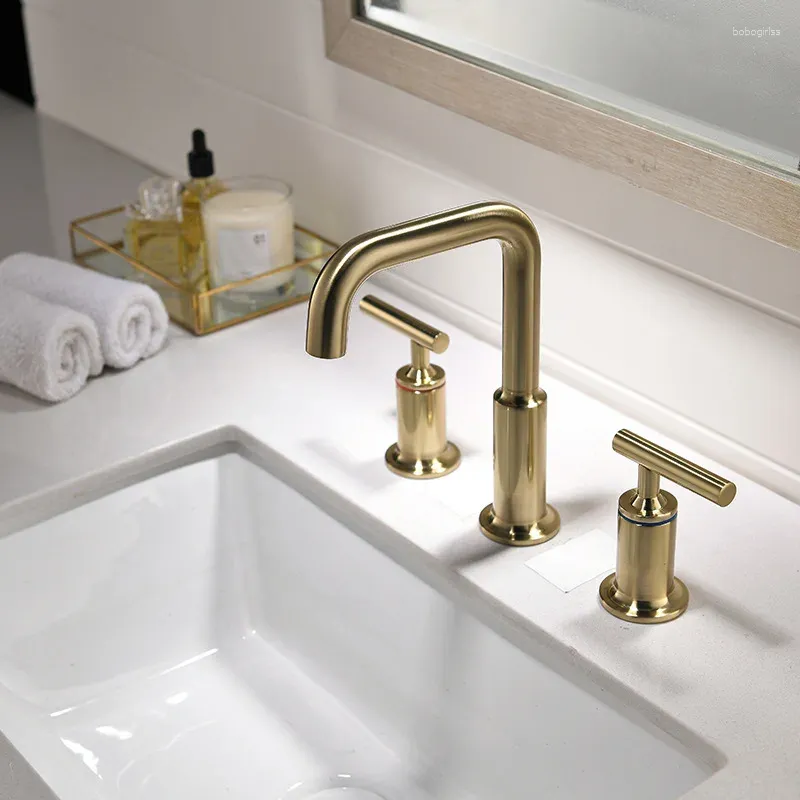 Waschbecken Wasserhähne Yiyu Drei-teiliger Badewanne Wasserhahn separates Beckendraht zeichnen goldene schwarze Kälte und Wasser