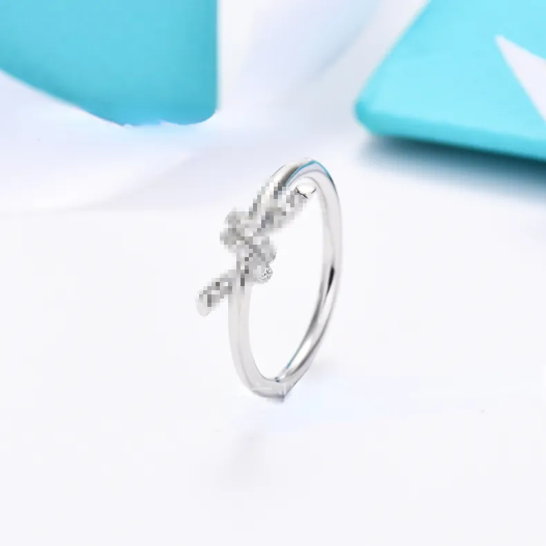 커플 디자이너 반지 하이 버전 다이아몬드 로프 링 흰색 구리 도금 18K 로즈 골드 유럽 및 미국 패션 광택 고리