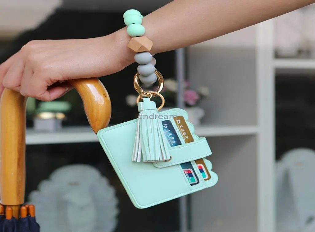 Leather Card Bag Tassel Charm Bracelets Silicone Bead Wristband Cuff Wallet Keychain for Women Children Fashion jewelry6545269