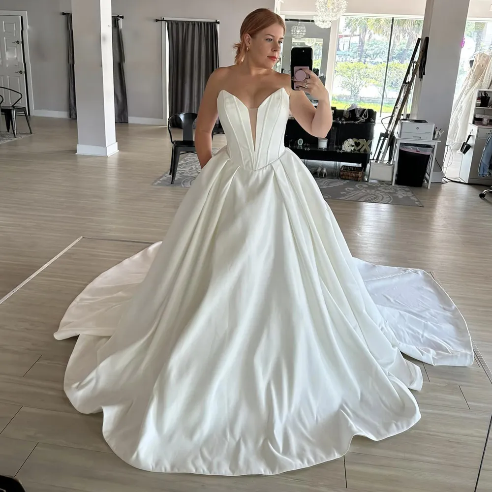 Modern Deep V Neck Puffy Wedding Dresses Corset Top Ruched Satin Bridal Dress Plus Size Draped Overskirt Bride Robe de Mariage