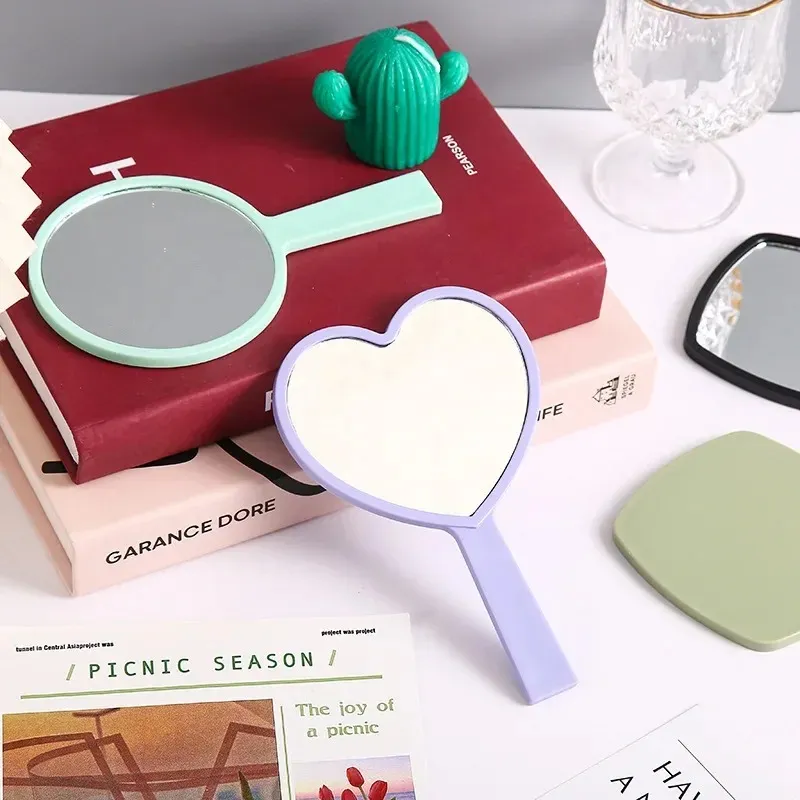 Handheld Make -up Mirror Quadratwaschtschaft mit Griffhand Salon Kompaktspiegel Kosmetik für Frauen