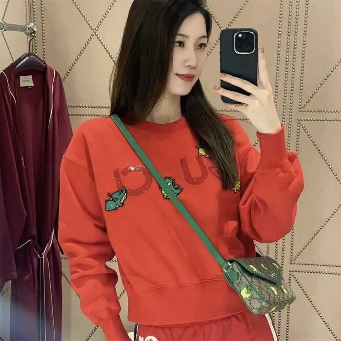 Высококачественная дизайнерская одежда Китай Красный Год. Ограниченный маленький динозаврный вышивка с блестками корейский круглый шейный свитер