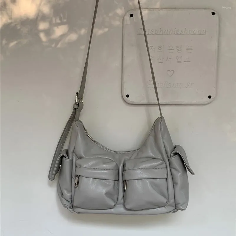 Multi pocket shoulder bag hotsell