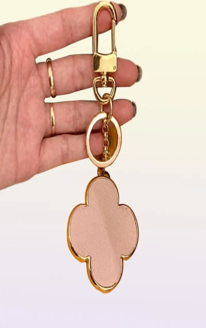 Diseñador de llaves de cuatro llaves de hoja afortunada Anillos de cadena de llaves de llave de llave de moda PU cuero hebilla para hombres Hanging9664536