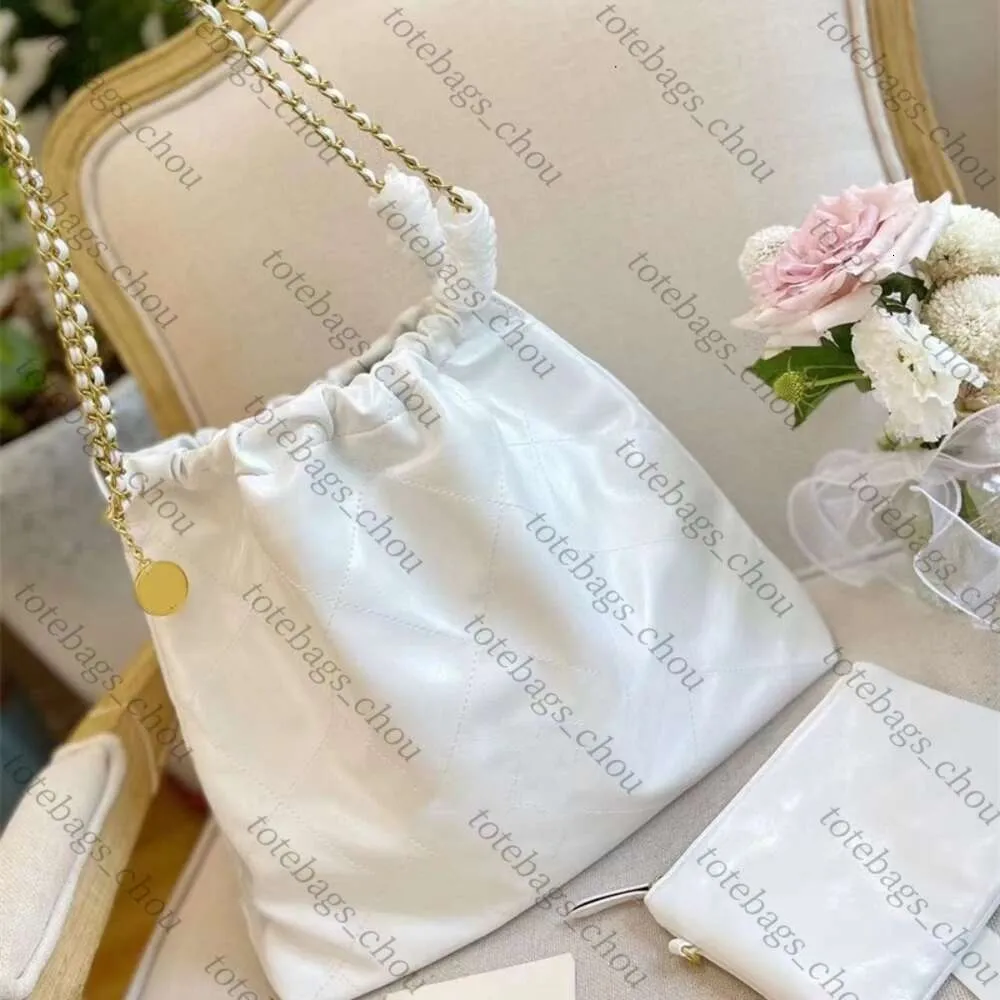 2024 Designer Garbage bag New small fragrant wind bright oil wax face chain bucket bag letter gold coin Tote Bag Single Shoulder Messenger Chain Bag female garbage bag