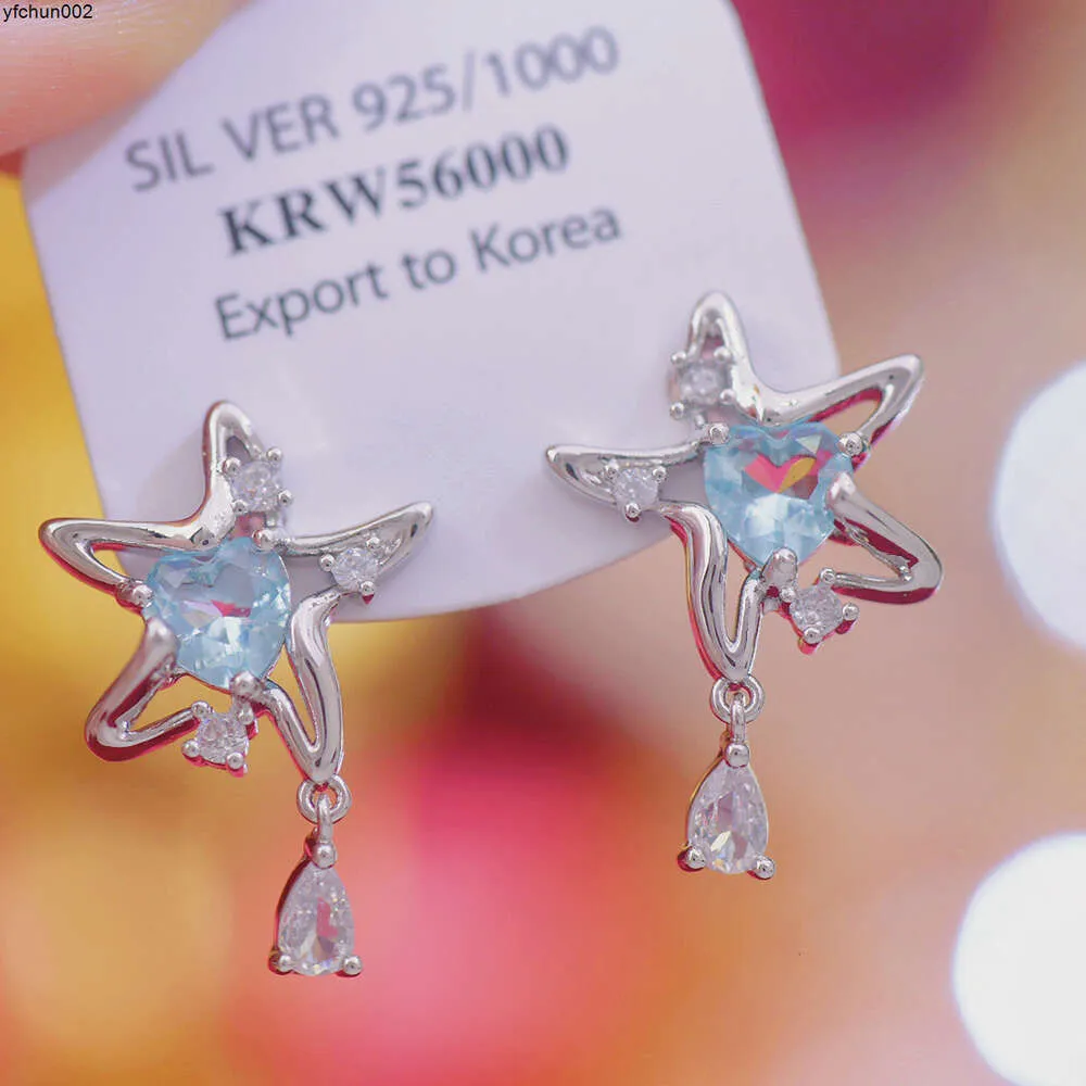 A218 Designers Droplettes étoiles de mer exquises et polyvalentes à la mode cool et la personnalité quotidienne de petites boucles d'oreilles uniques pour les femmes 4hmr
