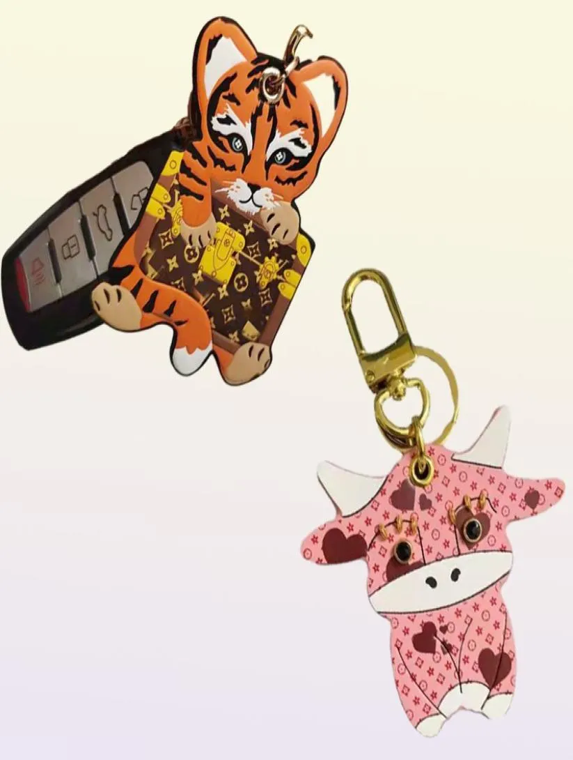 Anneau clé Classic Classic Pink Bull Tiger Tiger Leather Keychain Fashion Migne Cartoon Mobile Phone Sac Car Keychains Pendant Accessoires Pendange9093265
