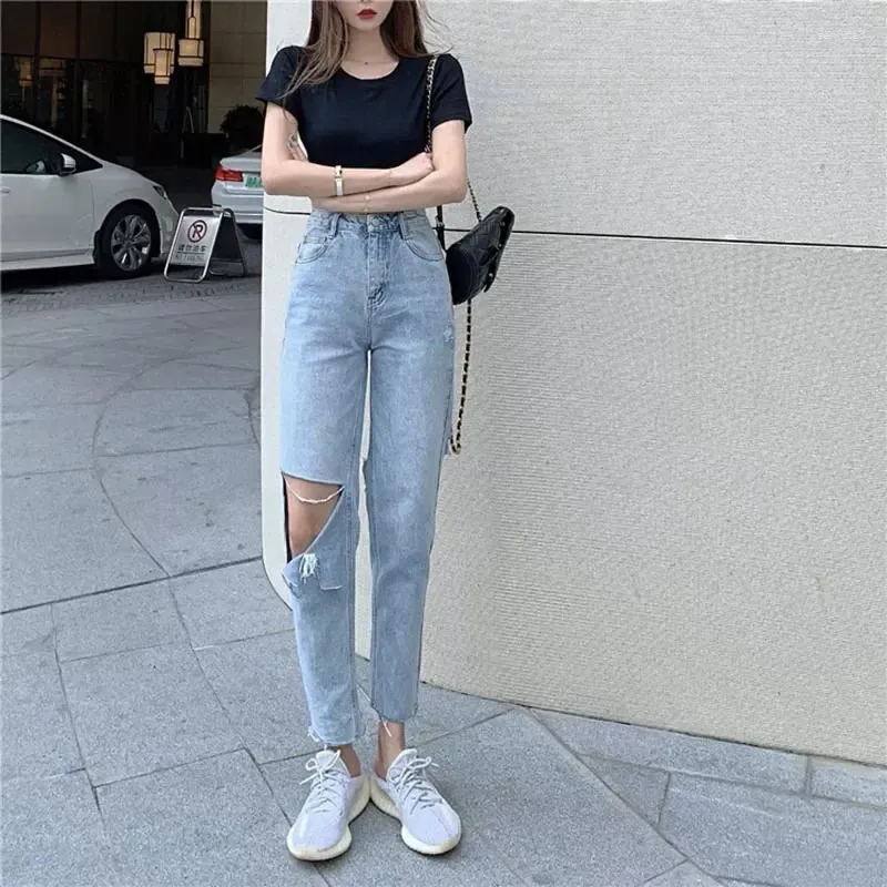 Kvinnors jeans höga midja rippade för lösa tunna denim byxor 2024 vintage kvinnliga trasiga byxor streetwear