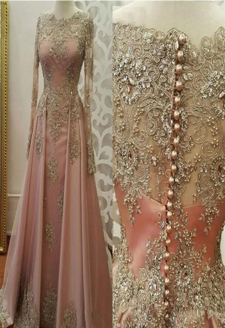 2021 Blush roze prom -jurken voor vrouwen dragen juweel nek lange mouwen gouden kanten appliques kristal kralen sexy formeel avondfeest g9063272