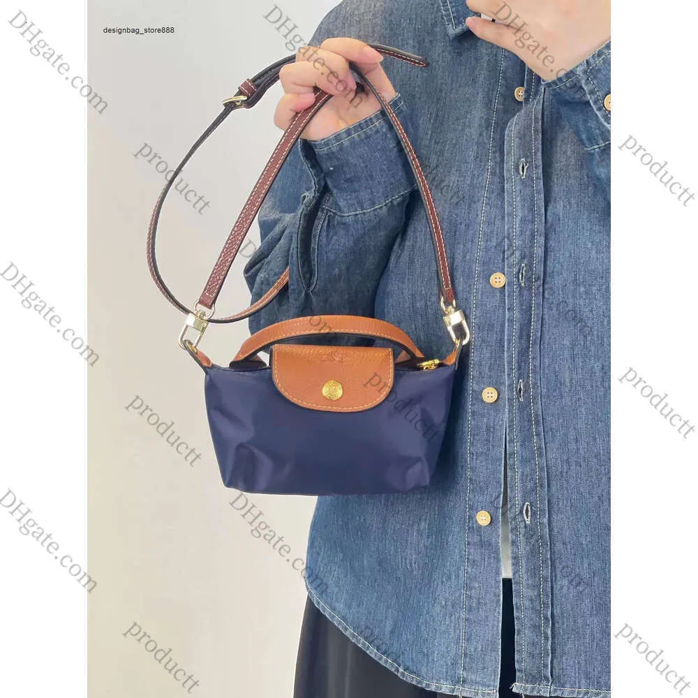 숄더백 브랜드 여성 Longxiang Bag 새로운 짧은 핸드 헬드 단일 크로스 바디 메이크업
