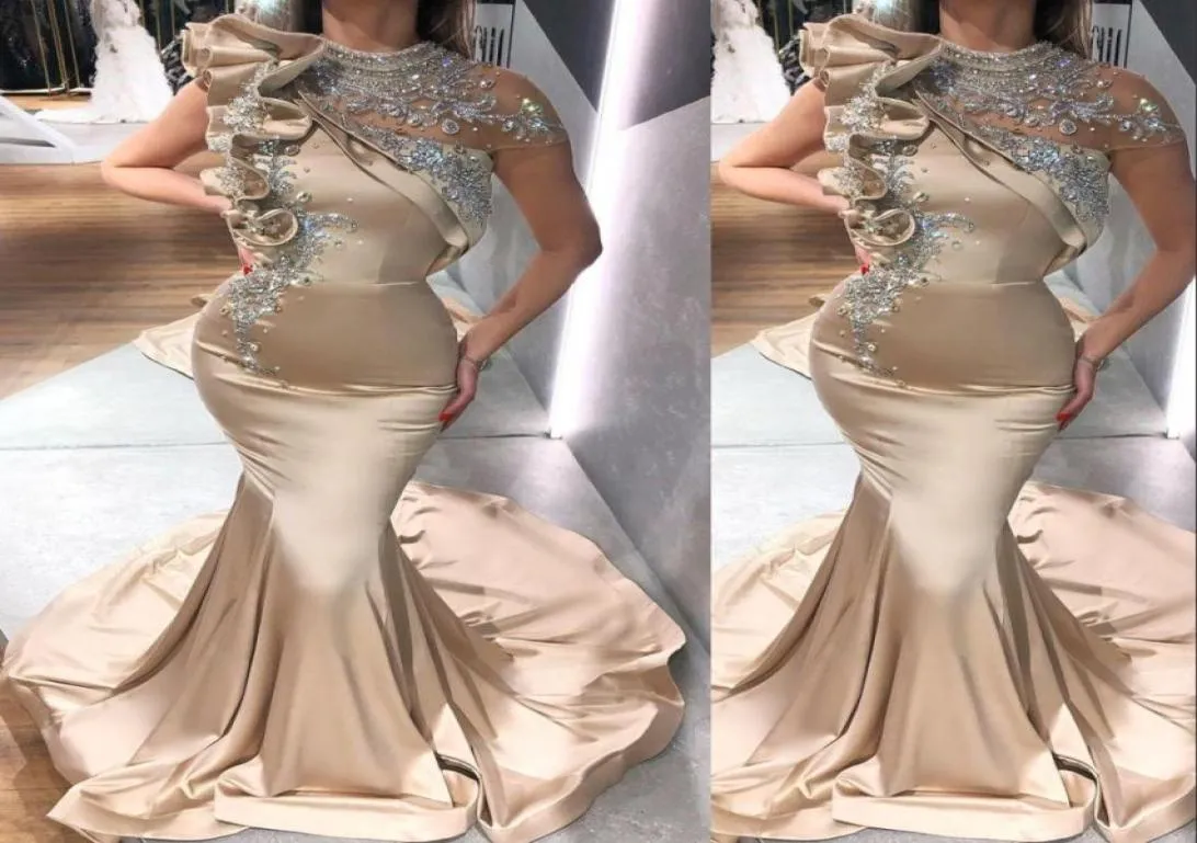 2023 Sexy Champagne Arabic Evening Dresses Wear Mermaid High Neck Cap Sleeve Silver Crystal Beads Ruffles Party Dress Open Back Pr5390654