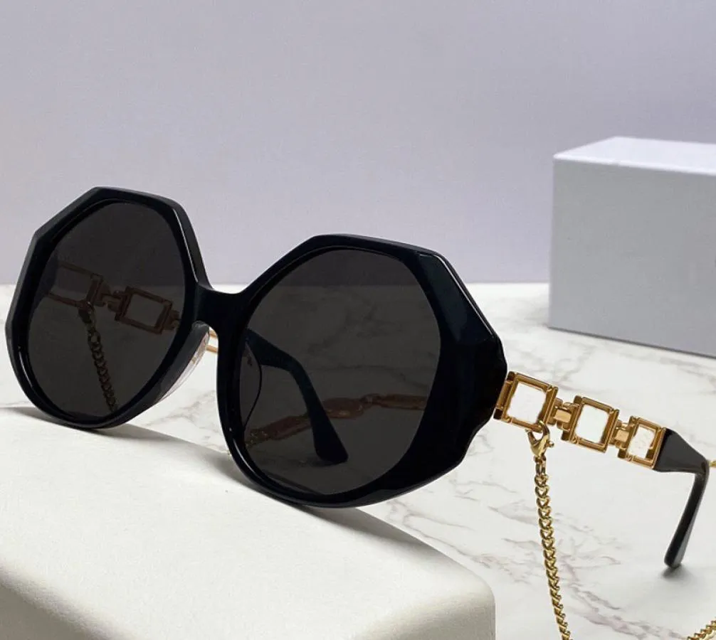 Женские солнцезащитные очки 4395 Модные покупки нерегулярные рамки круглой линзы металлический храм с золотой цепочкой.