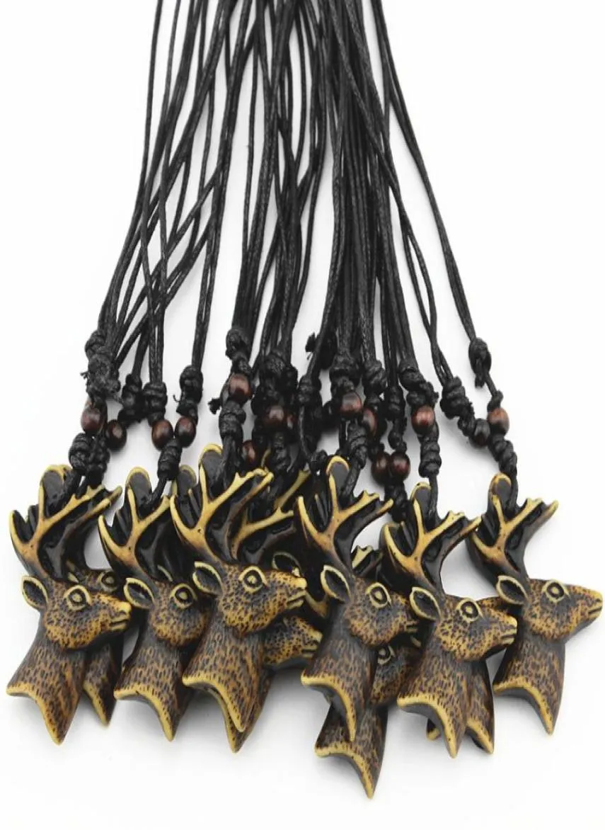 Bijoux entier 12pcslot 12pcs yak os os sculpté des cerfs de Noël reindeer collier coullier chauffeur chanceux présente Noël gi3652998