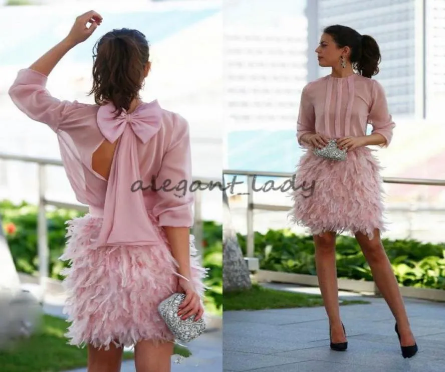 ゴージャスな羽毛ショートウエディングドレスピンクの長袖ボウイブニングドレスで開いて、特別な機会のためのカクテルパーティードレス3319290