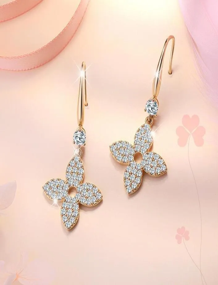 S1537 Fashion Jewelry S925 Silver Post Four Leaf Clover Earrings Simple Hollow Out Niche Design Dangle Earrings3428908