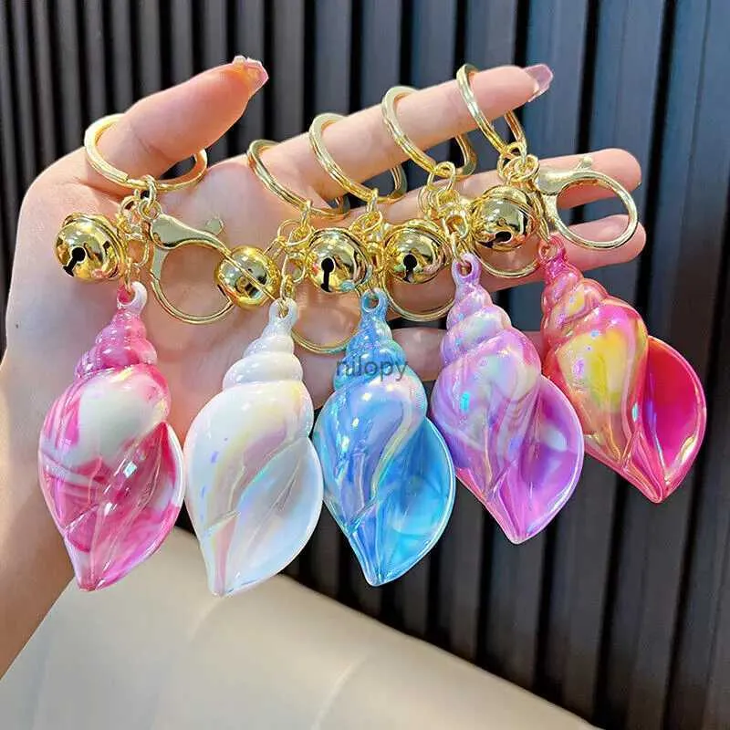 Keychains Lanyards 1pc Söt conch Keychain Creative Colorful School Bag ryggsäck Pendant Cartoon Utsökt bil nyckel Tillbehör Nyckelring för kvinnor