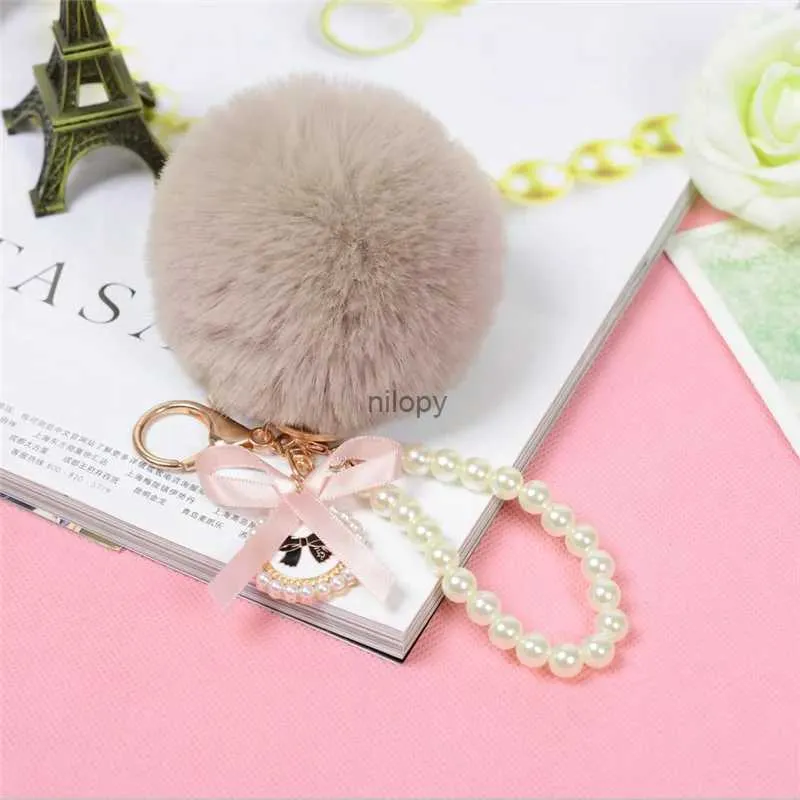 Keychains Lanyards 2022 Mode Pearl Chain Crystal Bottle Bow Pompom Keychain Car Women Handbag Key Chain Ring Fluffy Puff Ball Keychains smycken