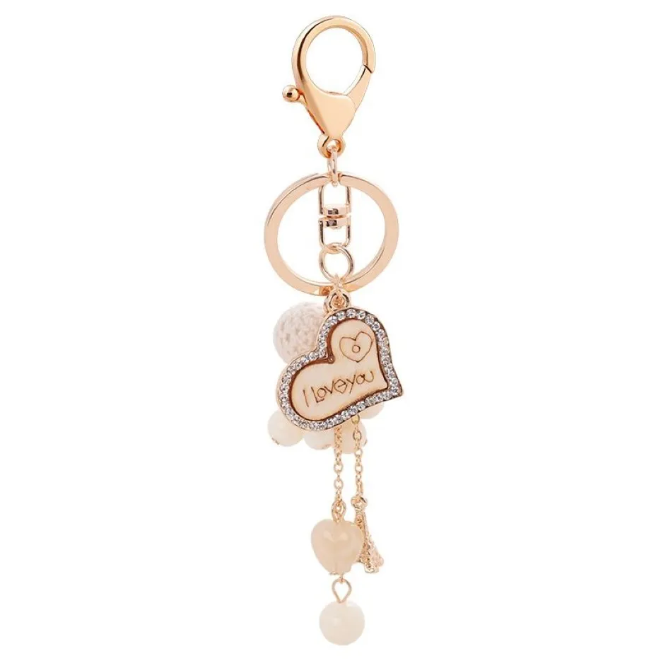 Heart Love Key Rings Jewelry Rhinestone Keychains Chain Fashion Design Design Perle Ball Pendant Sac Charmes Metal Car Cavyring Holder Cadeaux 247E
