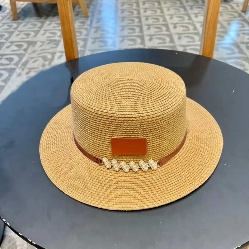Hochwertiger Vintage -Stil flacher Top Strohhut Kopfumfang 57 Designer Luxus Modetrend Sonnenhut Europäische Mütze mit Box