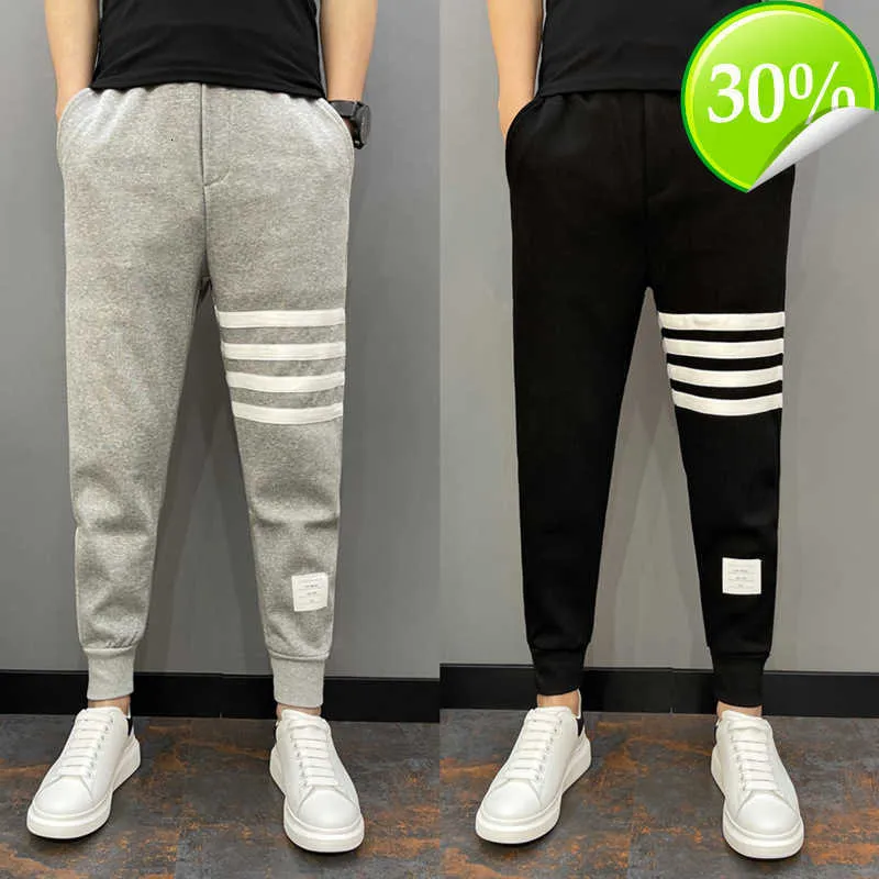 Marca de moda de moda vermelha de líquido inspportado outono cinza slim fit casual leggings quatro calças de guarda de barras