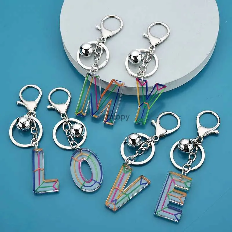 Keychains LETTERES LETTRE PENDANT Keillettes Résine Chaînes clés Anneaux pour femmes Migne ACRYLIC GLITTER COURT DU PORTE