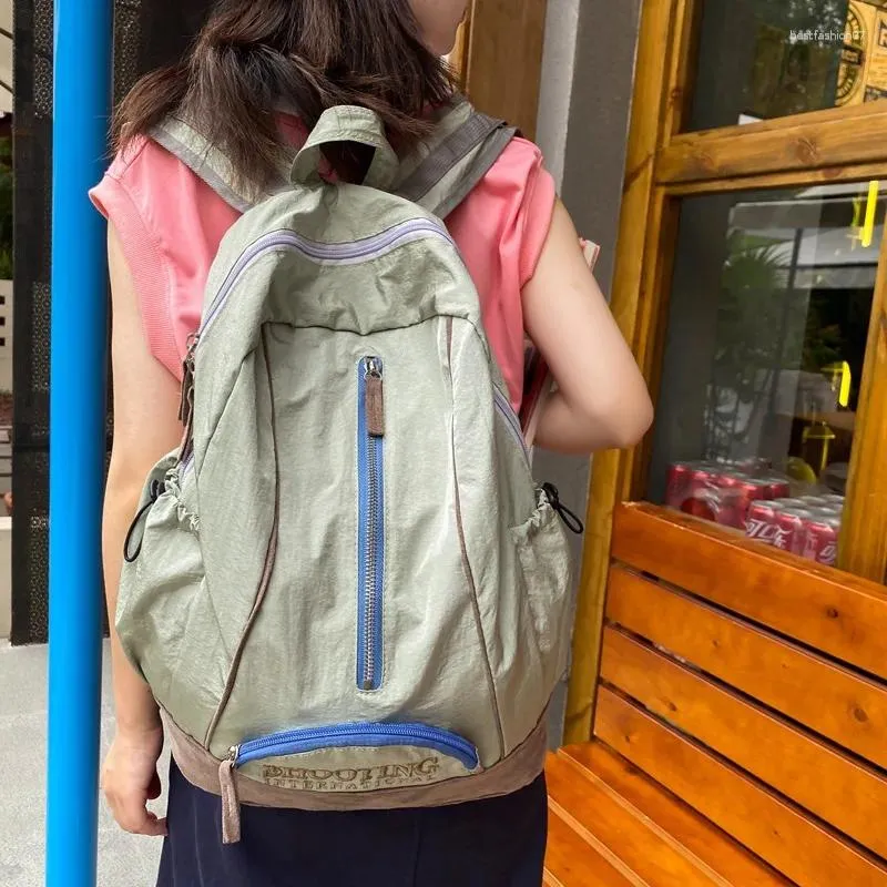 Backpack Japan moda moda harajuku de grande capacidade Ins inseto de casal neutro de casal neutro homens escolares