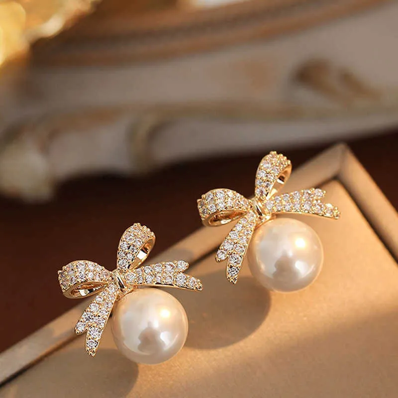 Hot Selling Bow Sparkling Diamond Pearl Earrings Womens Creative High-End Sense Simple Temperament Exquisite