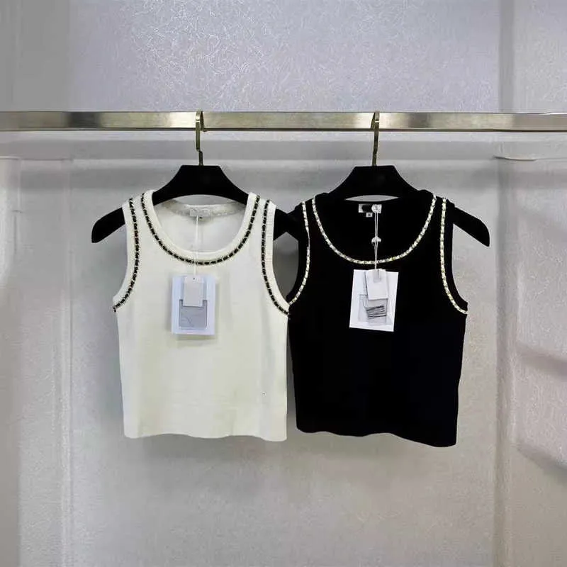 Tanks pour femmes concepteur de camis 24 au début du printemps Nouveau nanyou cha tissu motif confortable, simple, polyvalent et minimaliste tobe tricot top 6h0i