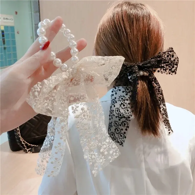1PCS Pearl Bow Knot Hair Corde Streamer Lace Japan et Corée du Sud Nouveau Ins Sen System Simple Streamer Grand Cercle d'intestin