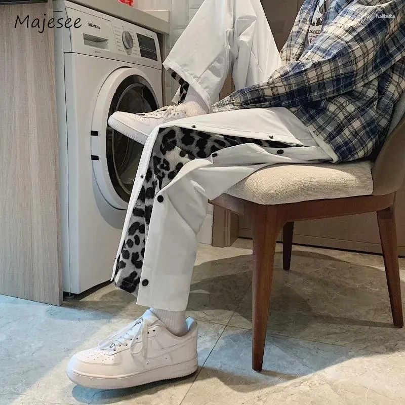 Pantalons masculins hommes Streetwear Streetwear Leopard Patchwork Chic Summer Bouton Summer Handsome Longle Longle de style coréen Teenagers Vertical