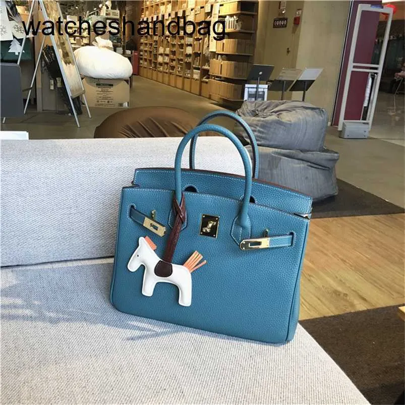 Sac de créateur en cuir authentique 7a Handswen Suture Quality Cuir Mandsbag Le cuir Logo QQ8Y11